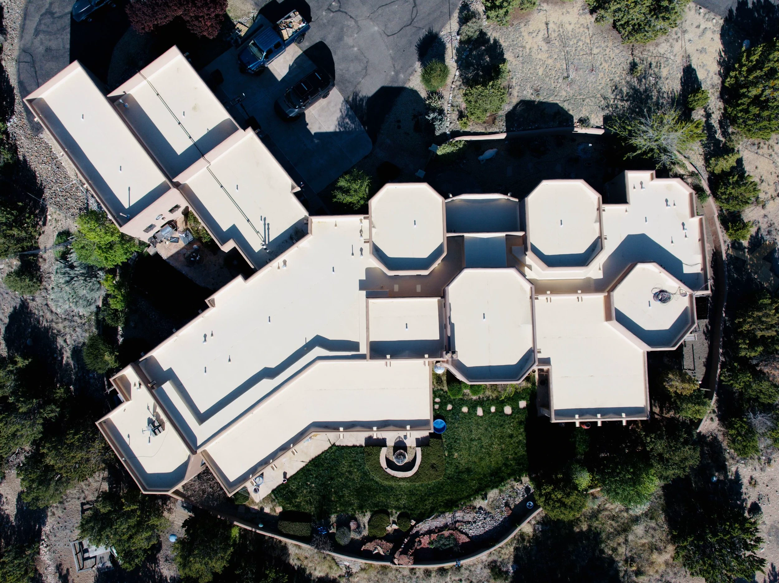 Aerial drone view of a large residential roof installed by Desert Storm Roofing